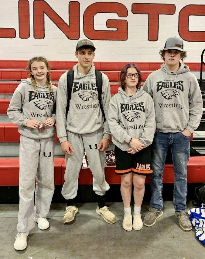 Madison Shepard, Bryce Eck, Trista Briggs and Colby Hueston after the Burlington Wrestling Tournament 