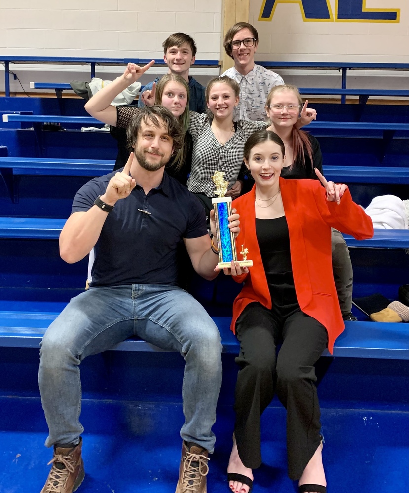 Uniontown HS Forensics Team pictured with Championship Trophy