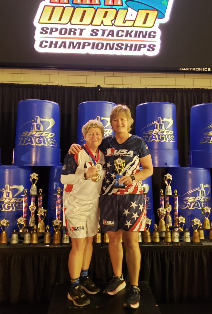 Jackie Hall and Kathy Zink receiving their medals