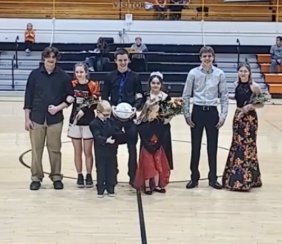Winter Homecoming King Kane Shepard and Queen Destiny Lucas with their Court