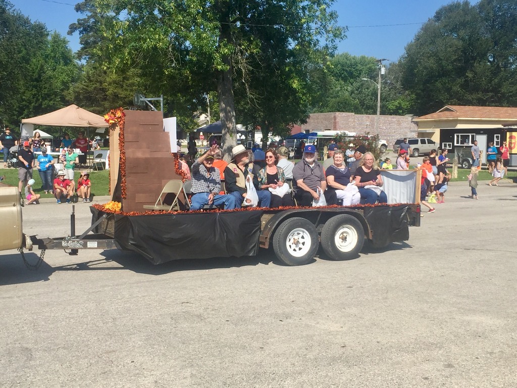 Members of the Uniontown HS Class of 1969 ride a float in the Old Settler's Day Parade.