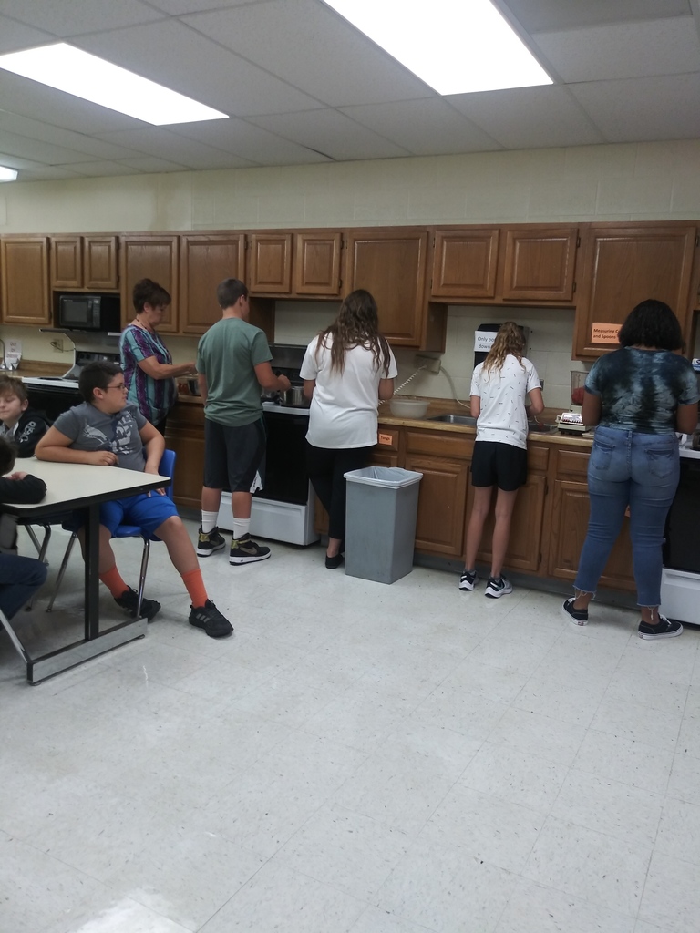 7th graders cooking the first batch of salsa!